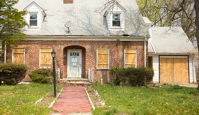 Boarded up house